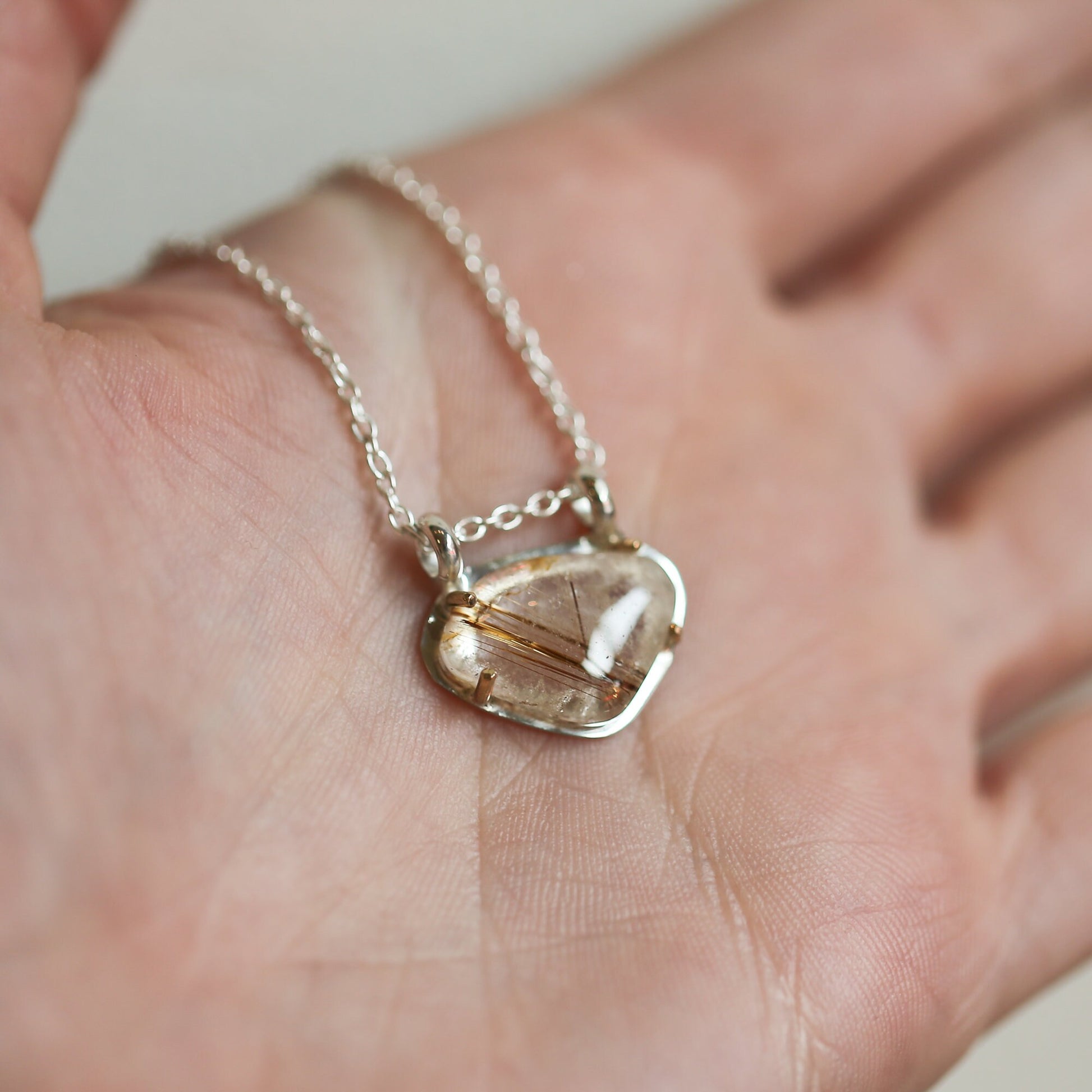 Copper Rutilated Quartz Pendant – Sterling Silver Necklace, Gold Detail